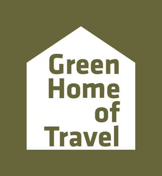 Logo GREEN HOME OF TRAVEL Reisebüro Anne Neuscheler